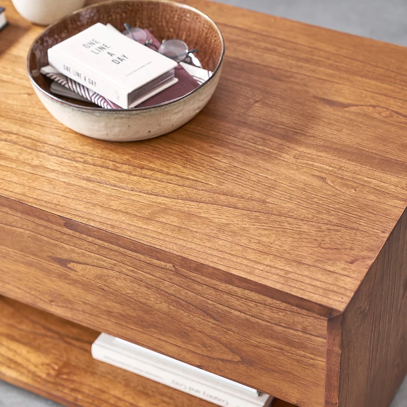Table basse en mindi massif finition noyer 120 cm