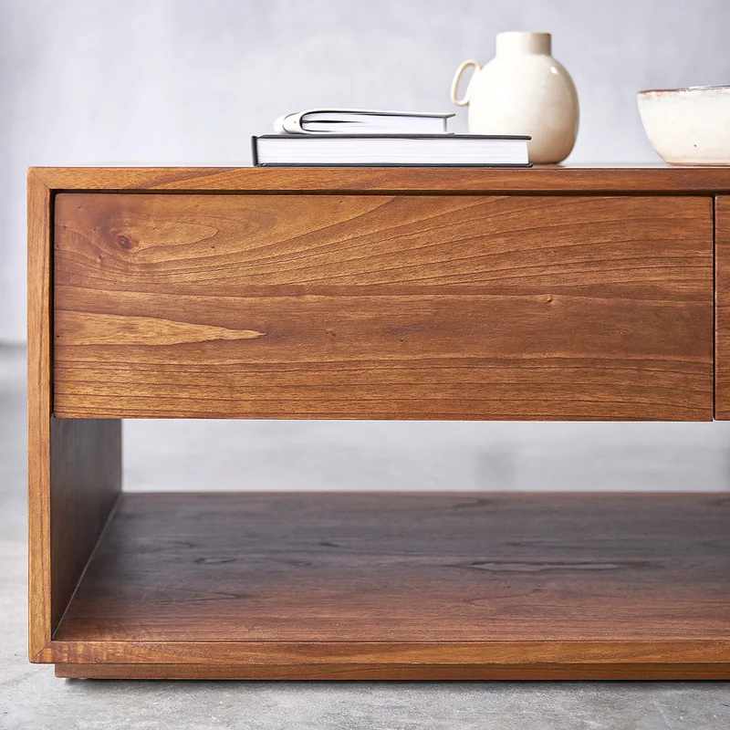 Table basse en mindi massif finition noyer 120 cm
