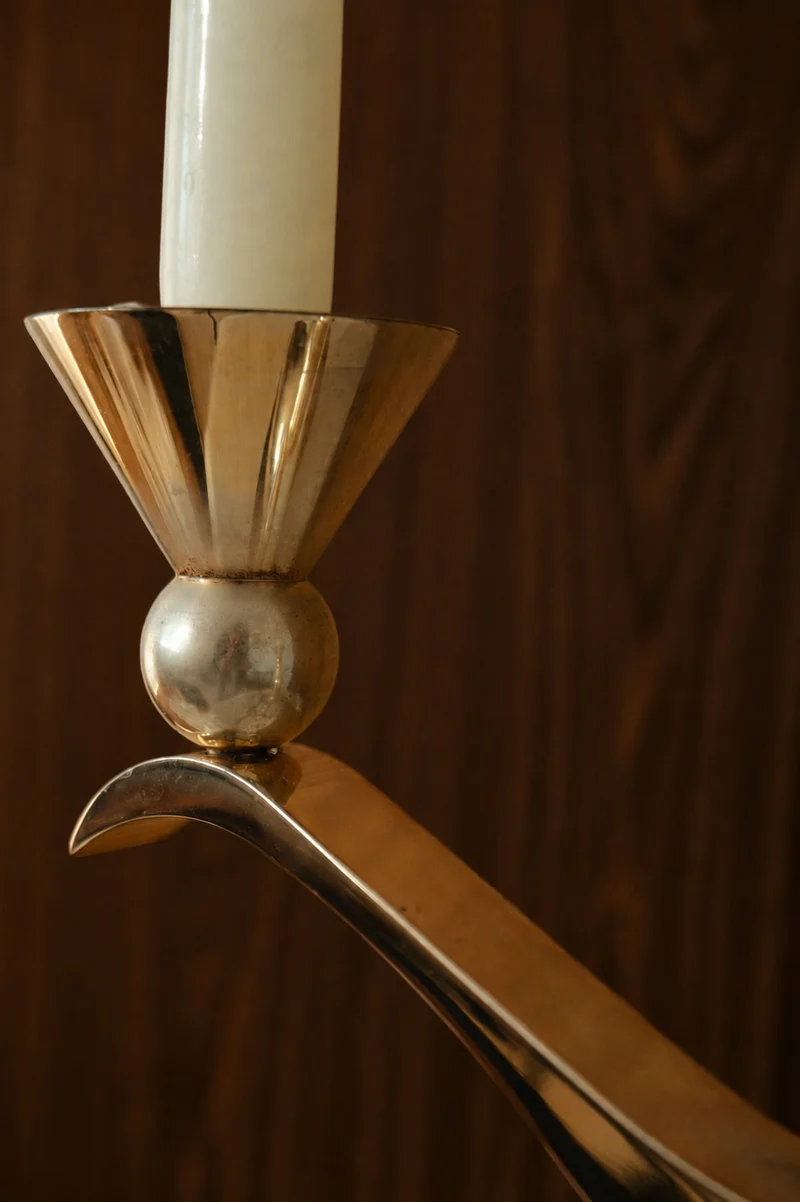 A Sculptural Silver- and Gold-Patinated Metal Candle Holder