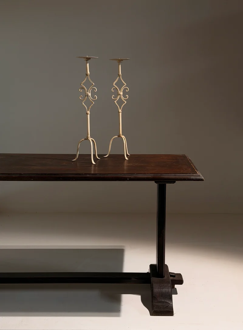 Pair of large cream-painted wrought-iron pricket candlesticks, Italy