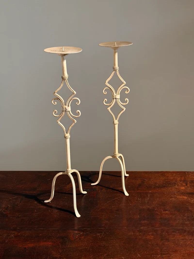 Pair of large cream-painted wrought-iron pricket candlesticks, Italy