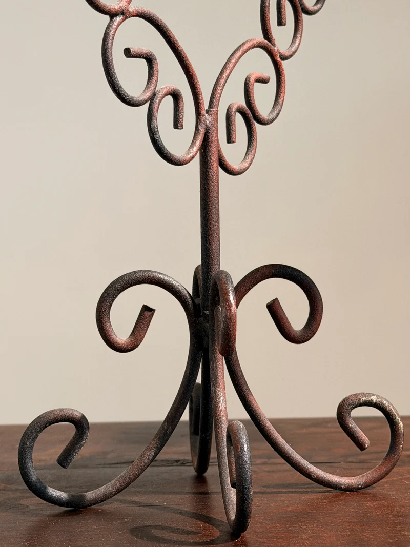 Pair of three-light wrought-iron candleholders, circa 1950