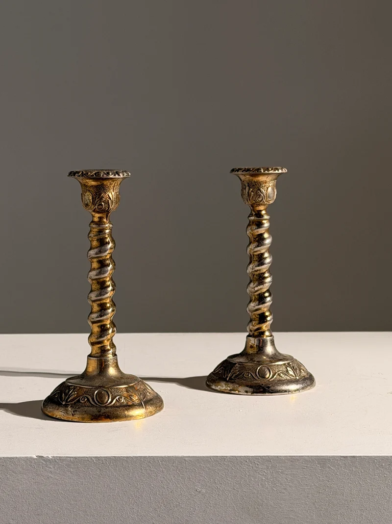 Pair of silver-plated candle holders, England