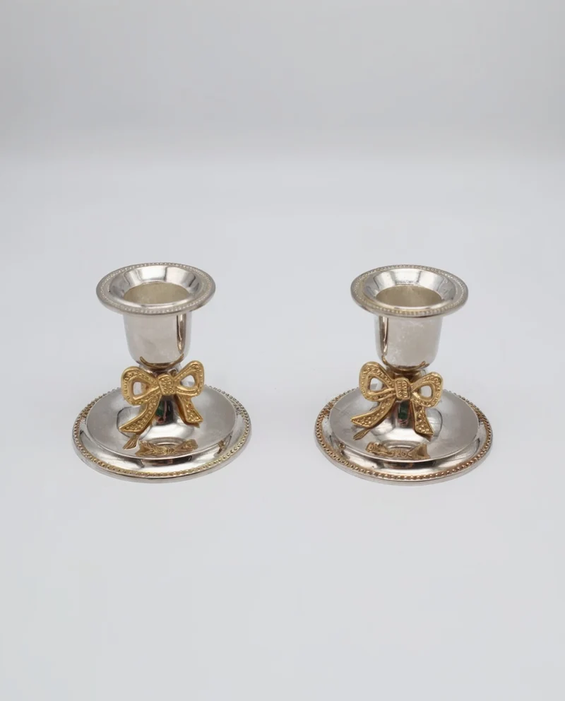 Pair of Vintage Silver-Plated Candlesticks with Gilt Bow Accents