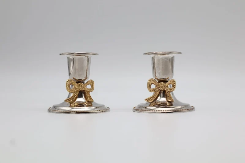 Pair of Vintage Silver-Plated Candlesticks with Gilt Bow Accents
