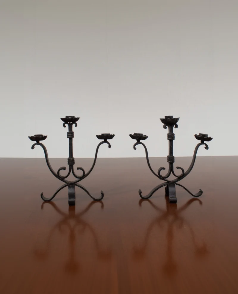 Pair of Brutalist Iron Candleholders with Sculptural Scroll Arms