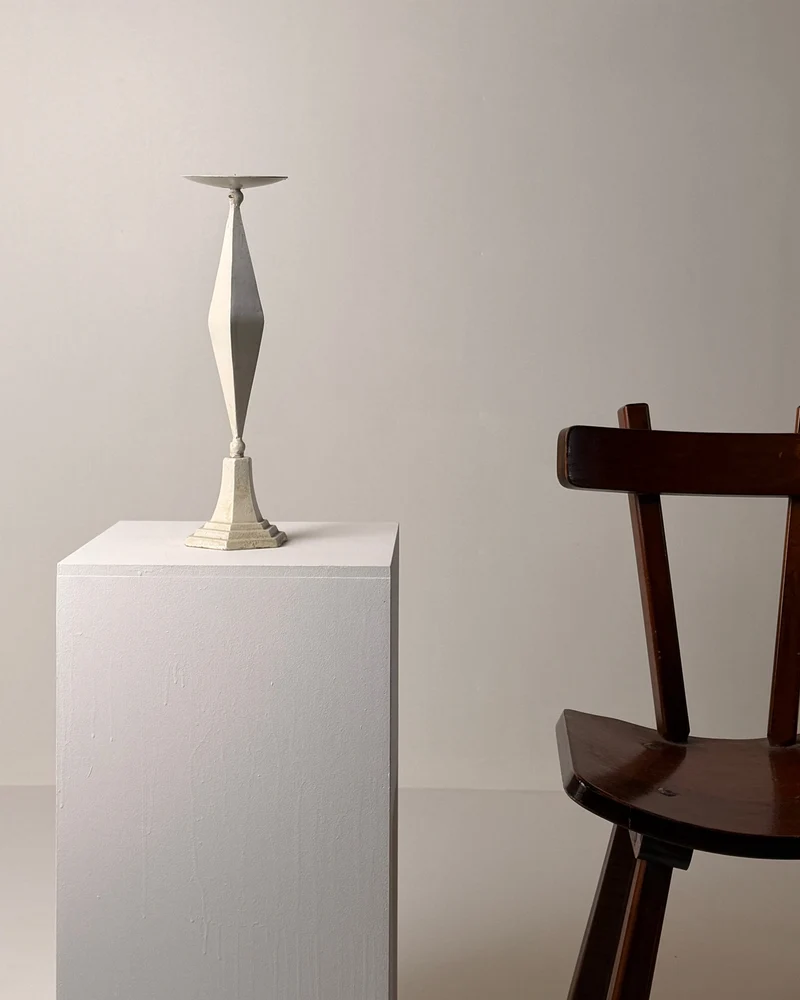 Imposing white-patinated iron candlestick, France, early 20th century