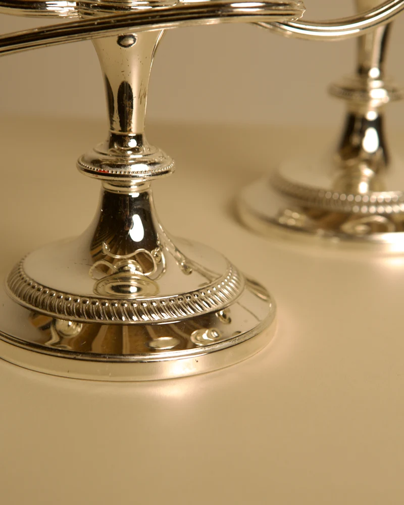 Pair of Italian metal "Medusa" candlesticks, 1980s