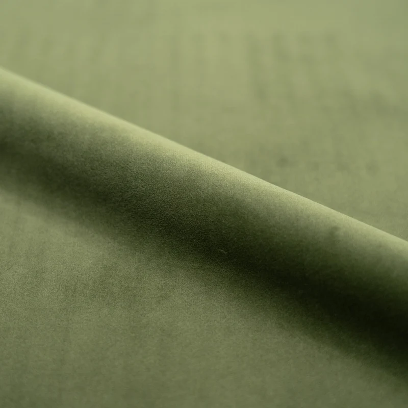Fauteuil pivotant Ysé en velours vert olive foncé