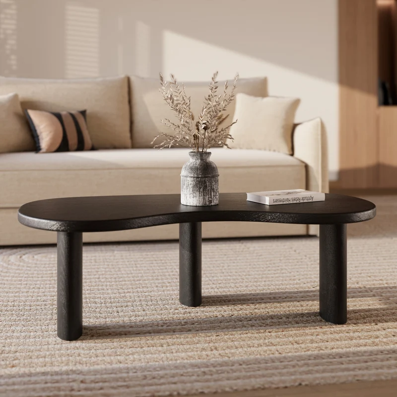 Table basse organique Brandan en bois massif de mindi noir