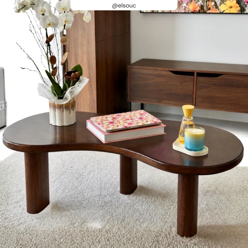 Table basse organique Brandan en bois massif de mindi foncé
