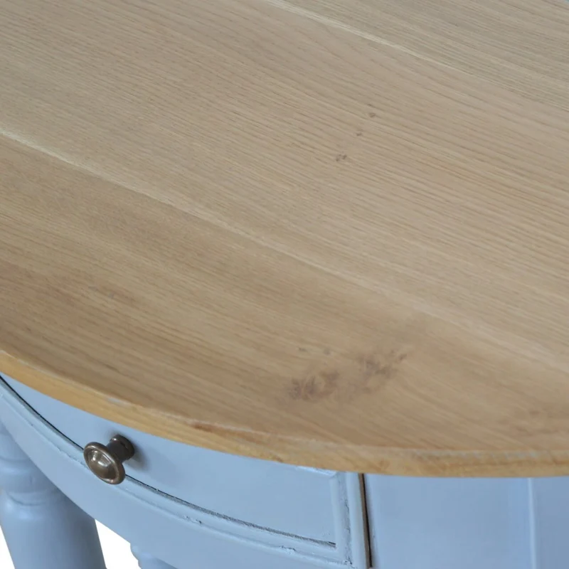 Table serpentine peint en gris massif