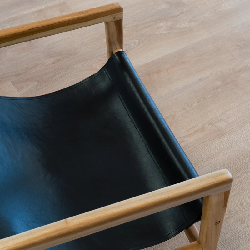 Fauteuil lounge Apache en teck et cuir noir