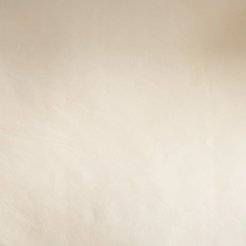 Fauteuil Kuna en teck et cuir tressé blanc