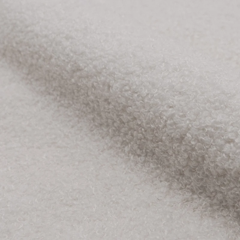 Fauteuil blanc/écru Aubin effet laine bouclette