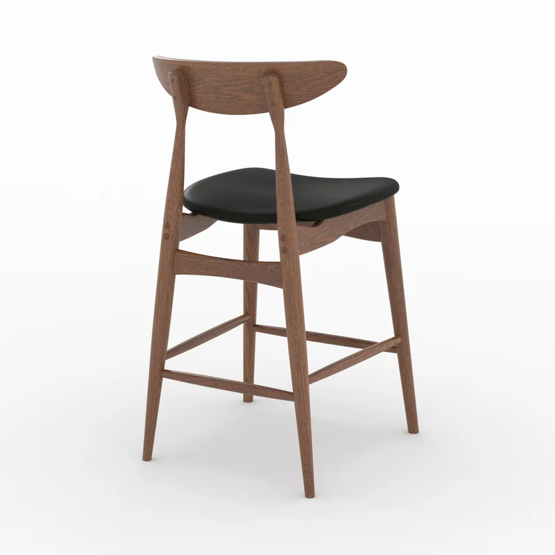 Lot de 2 chaises pour ilot central Josette 63,5 cm en cuir synthétique noir et bois d'hévéa